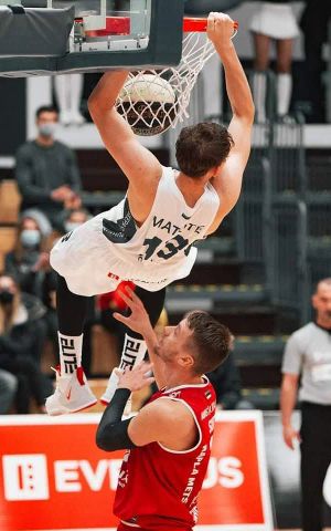 Andres Matute dunking the ball
