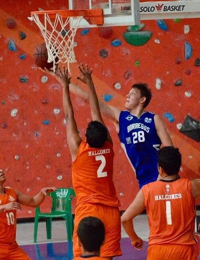 Andres Matute doing a layup